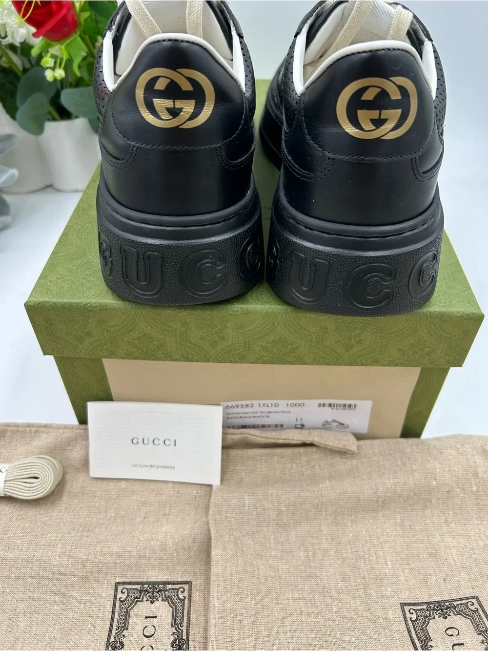 Men's Gucci, GG embossed, black leather sneakers size 11 fits 11.5 made in Italy